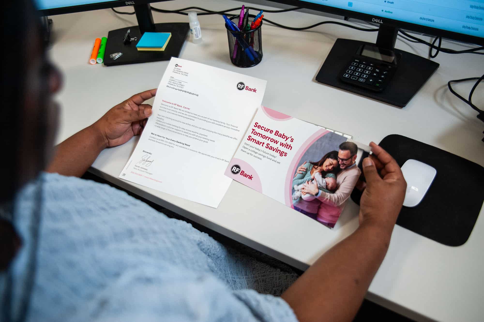 A financial services professional reviews marketing collateral for their bank